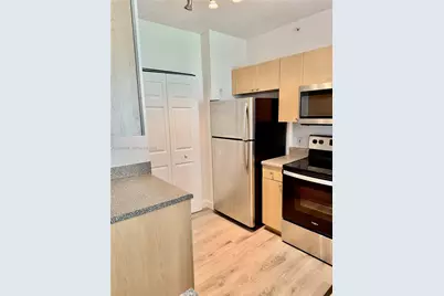 8010 N Nob Hill Rd #102, Tamarac, FL 33321 - Photo 6