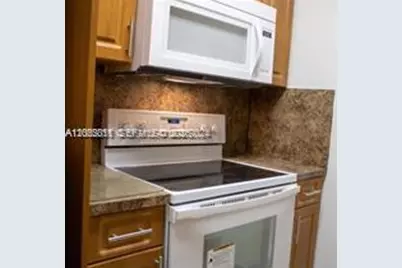 5501 NW 7th St #E204, Miami, FL 33126 - Photo 10