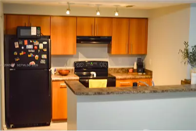 5840 W Sample Rd #305, Coral Springs, FL 33067 - Photo 6