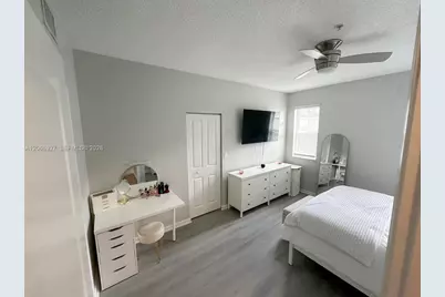 5840 W Sample Rd #305, Coral Springs, FL 33067 - Photo 12
