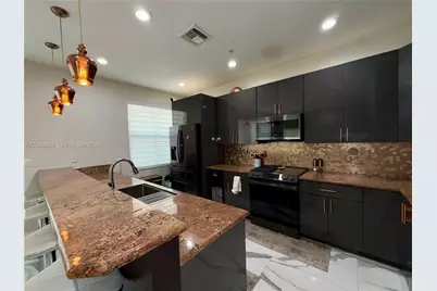 2851 W Prospect Rd #704, Tamarac, FL 33309 - Photo 18