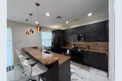 2851 W Prospect Rd #704, Tamarac, FL 33309 - Photo 20