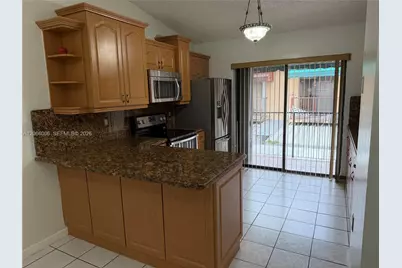 7792 W 29th Way #202, Hialeah, FL 33018 - Photo 4