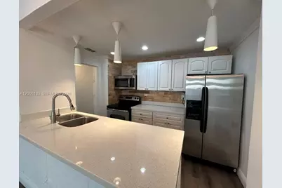 7545 E Treasure Dr #2A, North Bay Village, FL 33141 - Photo 1