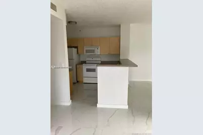 7980 N Nob Hill Rd #102, Tamarac, FL 33321 - Photo 2