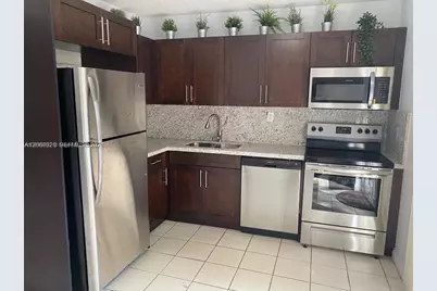 560 NW 82nd Pl #305, Miami, FL 33126 - Photo 2