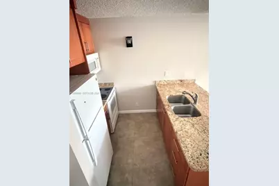 2501 Riverside Dr #114-A, Coral Springs, FL 33065 - Photo 6