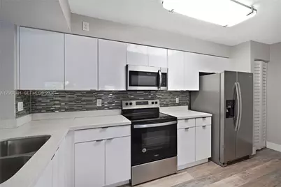 18840 NW 57th Ave #306, Hialeah, FL 33015 - Photo 1