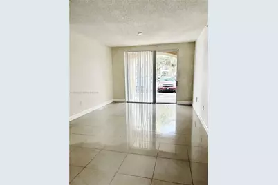 8030 N Nob Hill Rd #105, Tamarac, FL 33321 - Photo 6