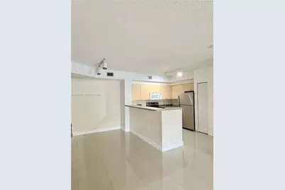 8030 N Nob Hill Rd #105, Tamarac, FL 33321 - Photo 1