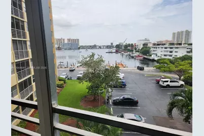 100 Golden Isles Dr #409, Hallandale Beach, FL 33009 - Photo 1