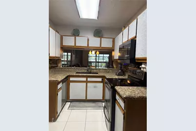 9830 W McNab Rd #208, Tamarac, FL 33321 - Photo 10
