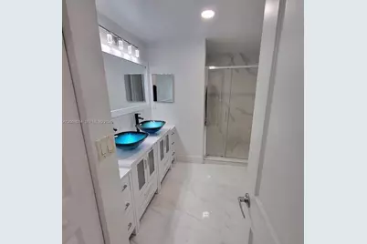 5840 W Sample Rd #302, Coral Springs, FL 33067 - Photo 4