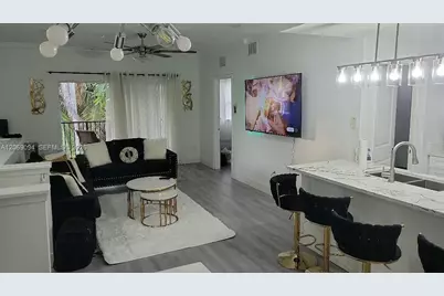 5840 W Sample Rd #302, Coral Springs, FL 33067 - Photo 1