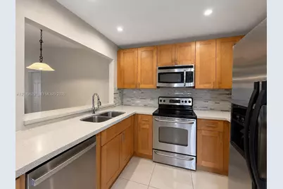 454 NE 210th Circle Ter #202-7B, Miami, FL 33179 - Photo 1
