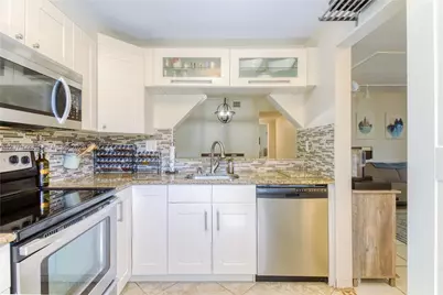 3095 N Oakland Forest Dr #104, Oakland Park, FL 33309 - Photo 10