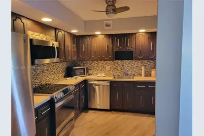 3090 N Course Dr #405, Pompano Beach, FL 33069 - Photo 2