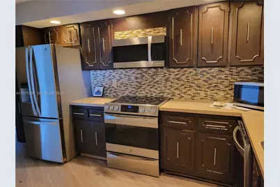 3090 N Course Dr #405, Pompano Beach, FL 33069 - Photo 1