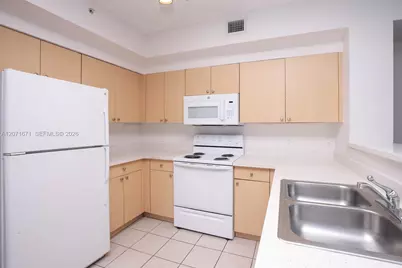 8050 N Nob Hill Rd #106, Tamarac, FL 33321 - Photo 4