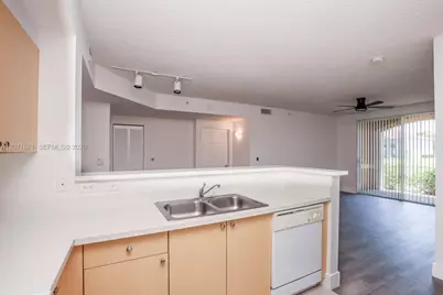 8050 N Nob Hill Rd #106, Tamarac, FL 33321 - Photo 6