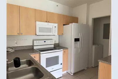 8010 N Nob Hill Rd #108, Tamarac, FL 33321 - Photo 6