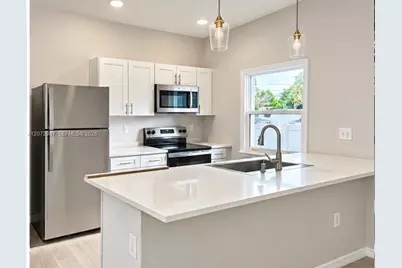 1217 E Ecstacy St, Lehigh Acres, FL 33974 - Photo 2