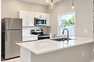 1217 E Ecstacy St, Lehigh Acres, FL 33974 - Photo 2
