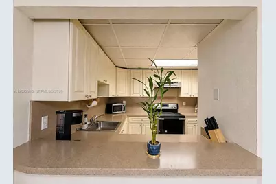 6980 NW 186th St #3-117, Hialeah, FL 33015 - Photo 12