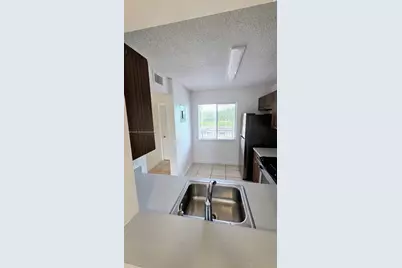 8620 N Sherman Cir #306, Miramar, FL 33025 - Photo 10