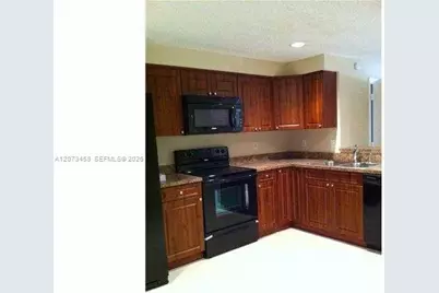 1621 Barcelona Way #6-32, Weston, FL 33327 - Photo 2