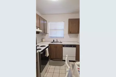 8000 N Sunrise Lakes Dr #309, Sunrise, FL 33322 - Photo 12
