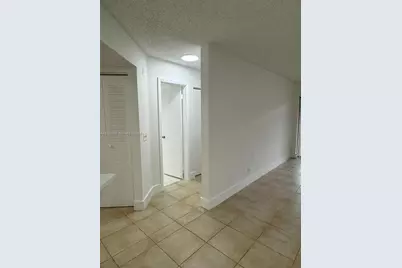 8801 Wiles Rd #103, Coral Springs, FL 33067 - Photo 4
