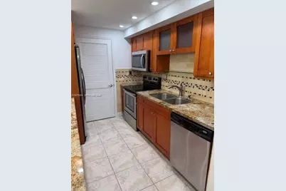 303 Racquet Club Rd #309, Weston, FL 33326 - Photo 14