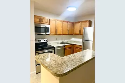 10749 Cleary Blvd #103, Plantation, FL 33324 - Photo 1