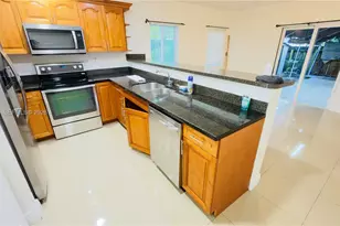 318 NE 166th St, Miami, FL 33162 - Photo 12