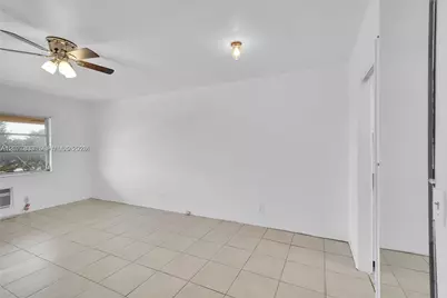 1050 E Sample Rd #309, Pompano Beach, FL 33064 - Photo 6