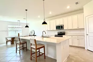 9291 Aqua Overlook Ct, Lehigh Acres, FL 33936 - Photo 12