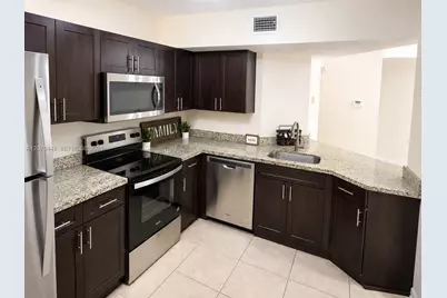 8821 Wiles Rd #304, Coral Springs, FL 33067 - Photo 4