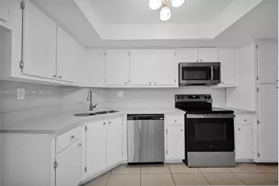 100 Golden Isles Dr #109, Hallandale Beach, FL 33009 - Photo 12