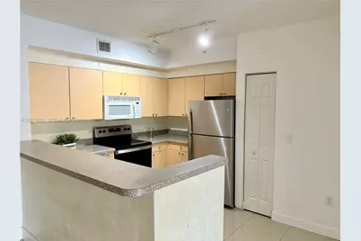 8030 N Nob Hill Rd #105, Tamarac, FL 33321 - Photo 2
