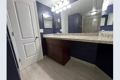 2881 N Oakland Forest Dr #311, Oakland Park, FL 33309 - Photo 14