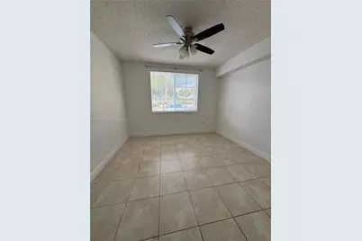 7920 N Nob Hill Rd #103, Tamarac, FL 33321 - Photo 4