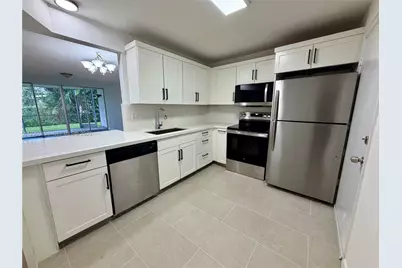 1101 NE 191st St #H101, Miami, FL 33179 - Photo 1