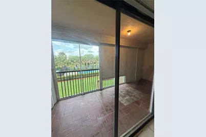 2079 Coral Ridge Dr #N208, Coral Springs, FL 33071 - Photo 12