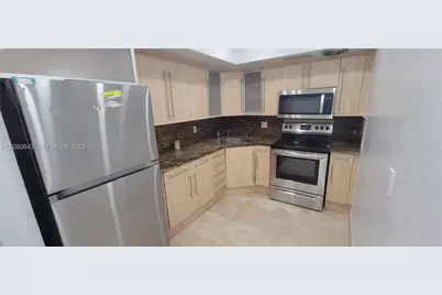 455 Golden Isles Dr #310, Hallandale Beach, FL 33009 - Photo 4