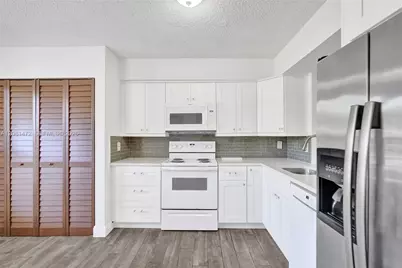 4570 NW 18th Avenue #202, Deerfield Beach, FL 33064 - Photo 8