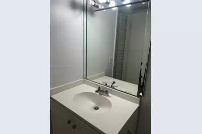 18111 NW 68th Ave #F106, Hialeah, FL 33015 - Photo 10