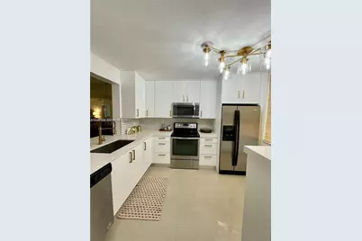 8592 W Sunrise Blvd #111, Plantation, FL 33322 - Photo 8