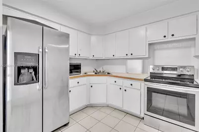 1540 NE 191st St #320, Miami, FL 33179 - Photo 6