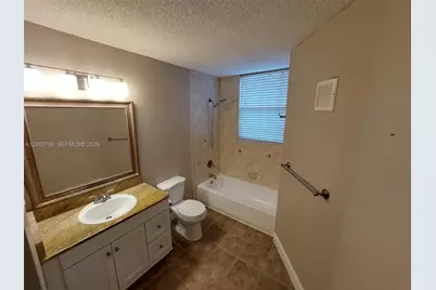 641 Lyons Rd #11-207, Coconut Creek, FL 33063 - Photo 8